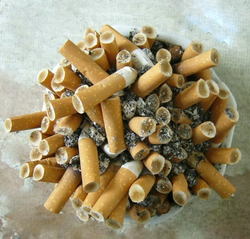 ashtray full of cigarette butts