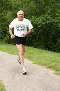 man jogging on a path