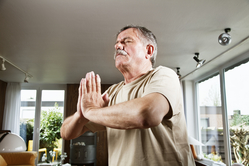 adult man meditating