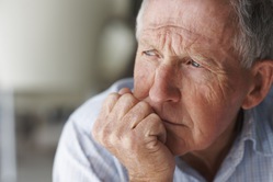 man looking pensive or depressed