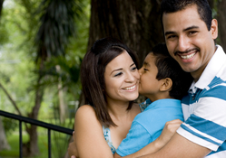 man and woman with child - happy family