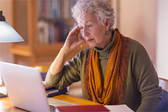 older lady looking at a computer