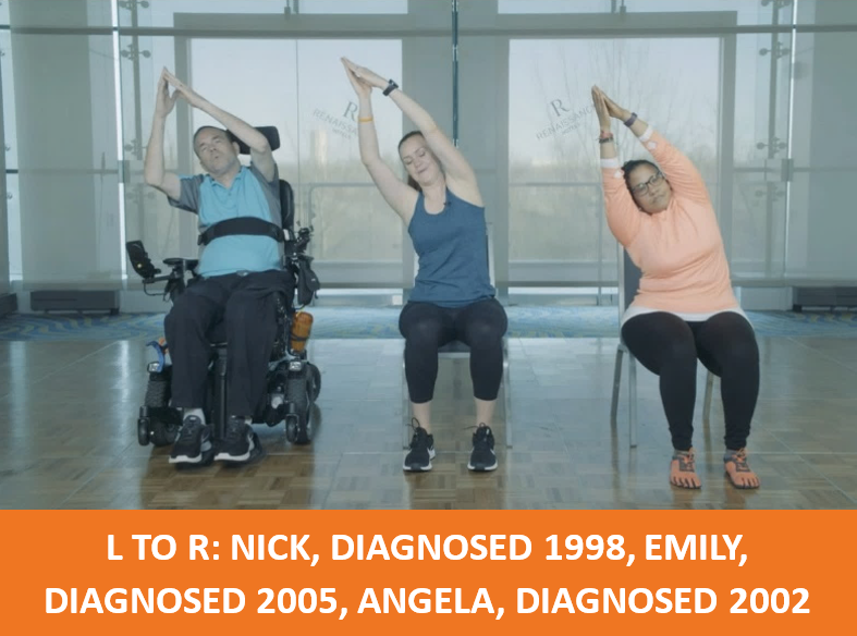 three people exercising while sitting