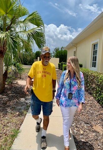 Veteran and Coach walking together