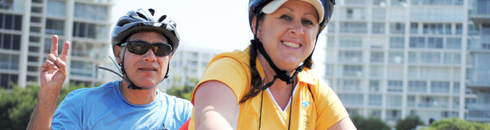 two people riding a bike