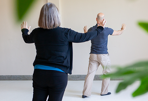 Image of people practicing Tai Chi.