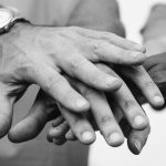 Black and white image of hands.