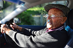 elderly man driving