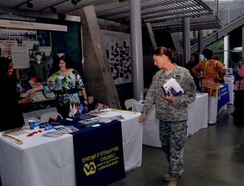 Forum participant in uniform browsing the Information Marketplace.