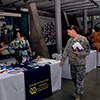 Forum participant in uniform browsing the Information Marketplace.