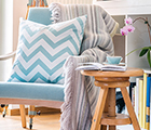 Chair in front of a book case